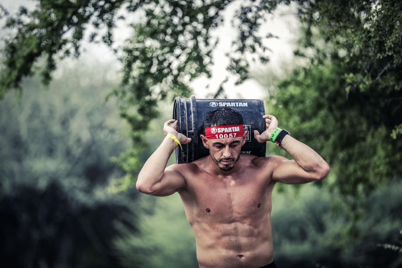 Heavy squat — focused training session at Hybrid × Dior